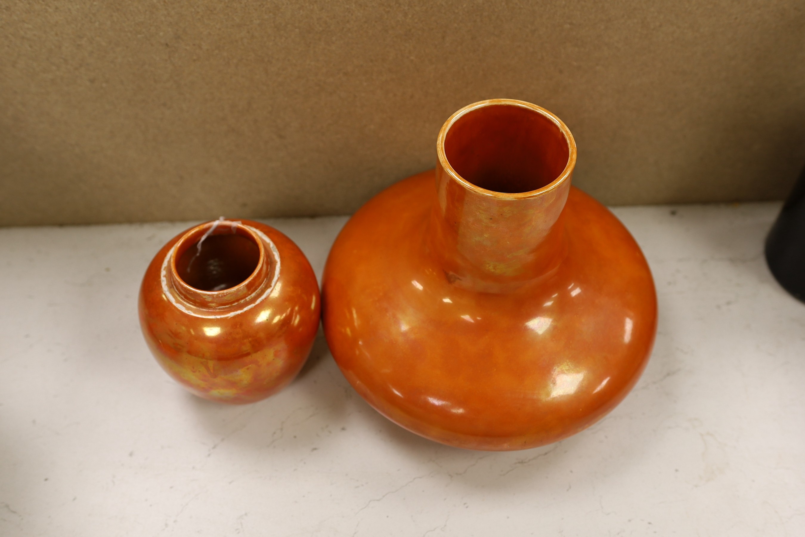 A Ruskin orange lustre vase, dated 1914 and a similar ginger jar, dated 1920, tallest 19cm